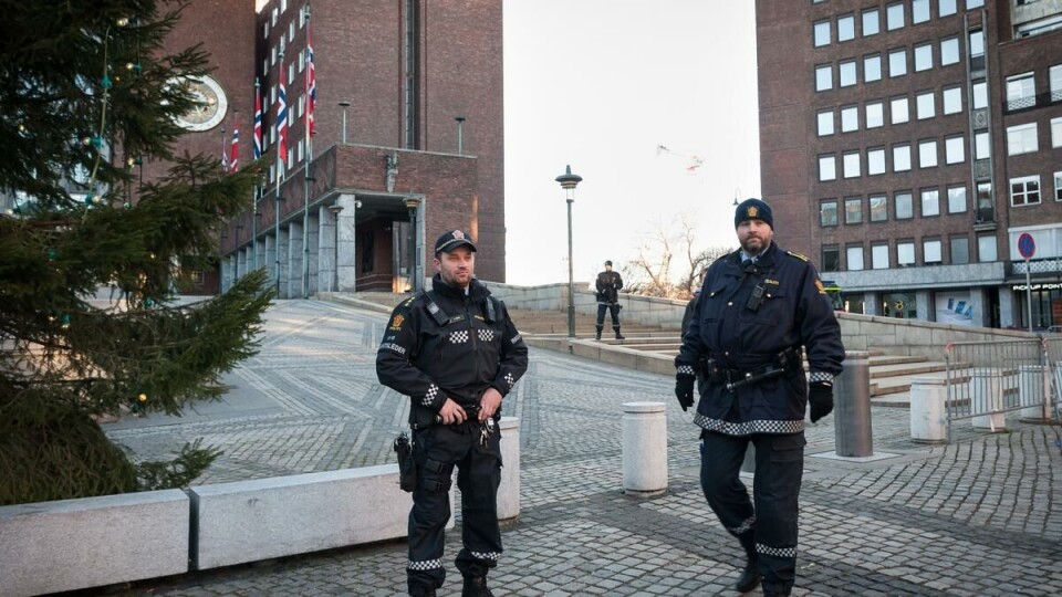 Police stand guard outside Oslo City Hall before the Nobel Peace Prize ceremony.