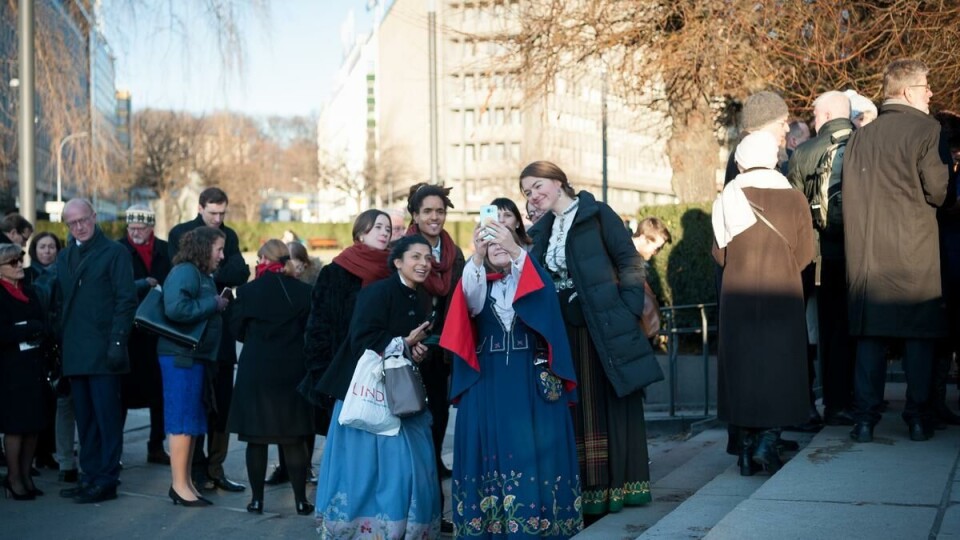 Mjelstad waits outside City Hall with other ICAN and Norwegian People's Aid volunteers.