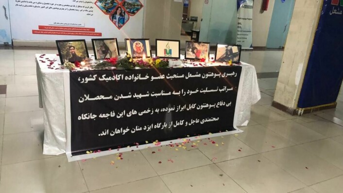 Minnestund: Lys og bilder ble satt opp i gangene til universitetene i ukene etter angrepet, i minne om livene som gikk tapt.