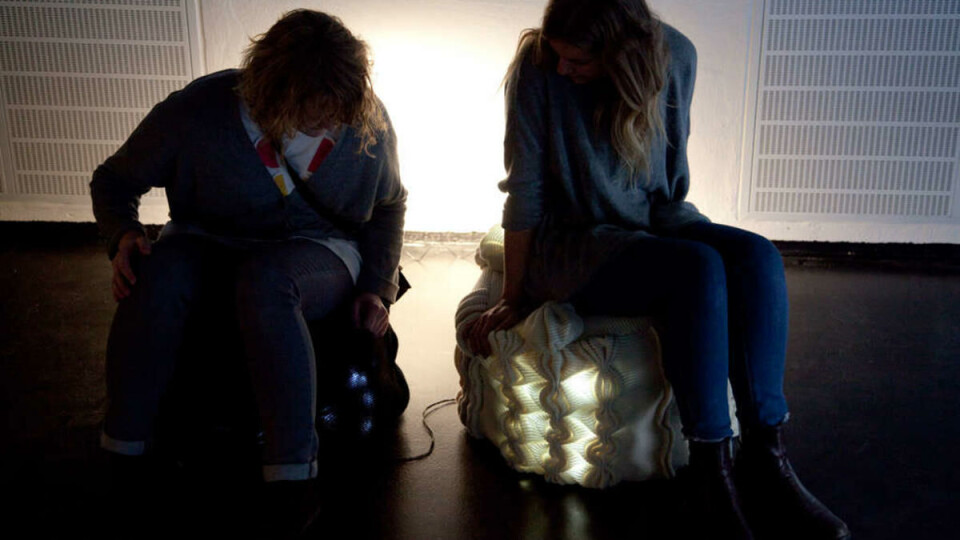Linked together: The students have used electronic fabric to link people together. If you sit down on one stool the other one lights up – and there you have your conversation.