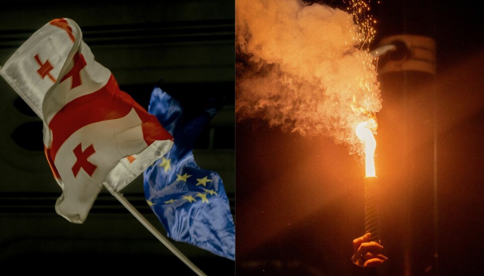 PROTESTHANDLING: En demonstrant heiser en håndbluss i
protest mot den georgiske regjeringen. Vedkommende risikerer bøter
opp til 2000 lari (ca. 8000 NOK) for denne handlingen.